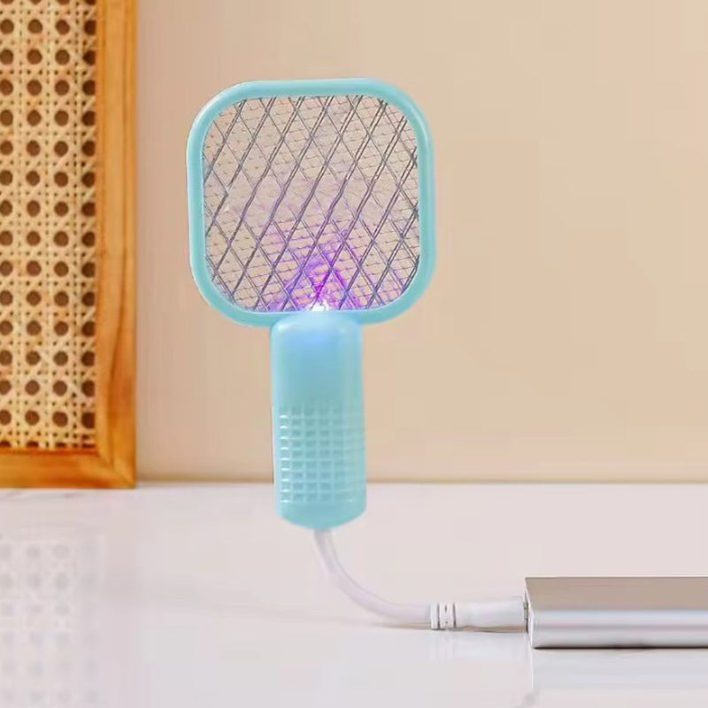 "Elektrisk myggsmällare i svart, vit, rosa, grön för effektiva insektborttagning inomhus/utomhus, stilren design."