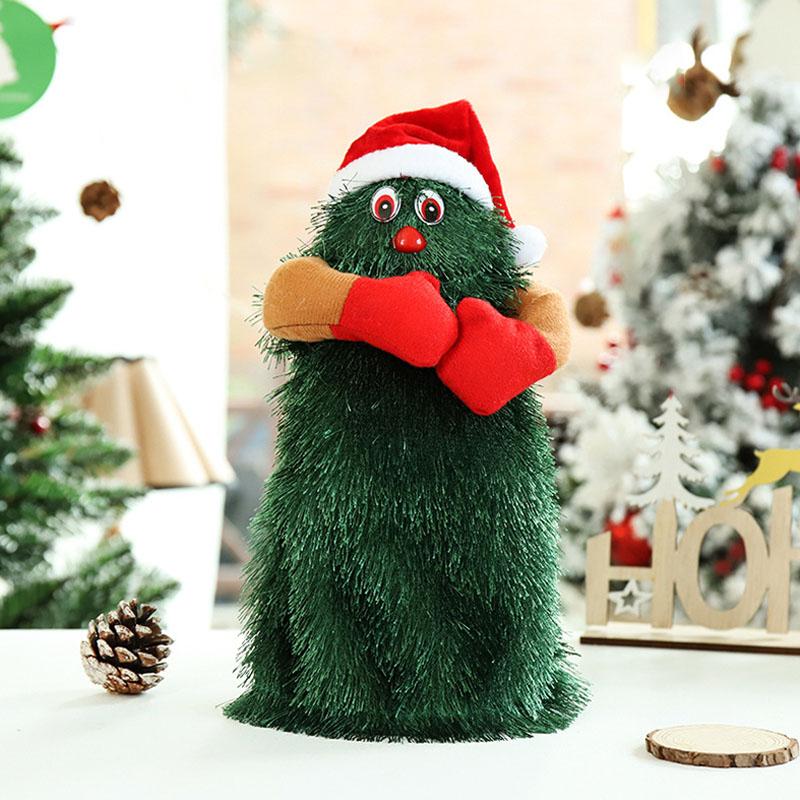 "Elektrisk roterande julgran dekoration med stilrena detaljer, levande ljus och musik, placerad på bord eller fönsterbräda."