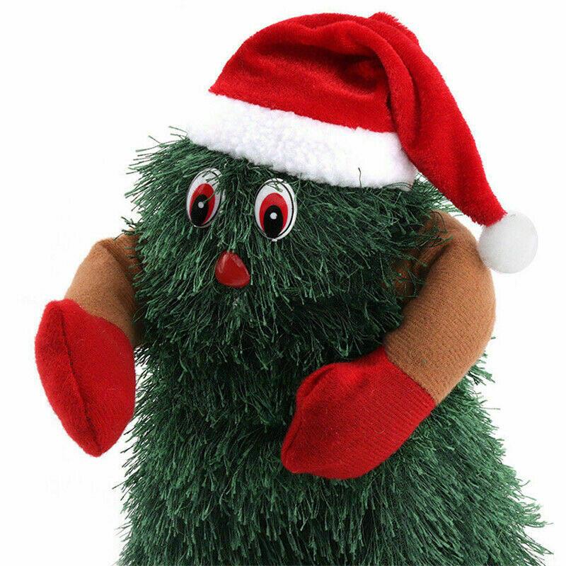 "Elektrisk roterande julgran dekoration med stilrena detaljer, levande ljus och musik, placerad på bord eller fönsterbräda."