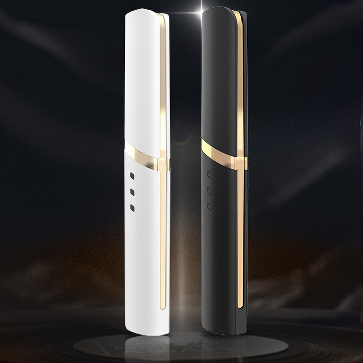 "Elektrisk uppvärmd ögonfransböjare i vit design, snabb uppvärmning för långvarigt böjda och skyddade fransar."