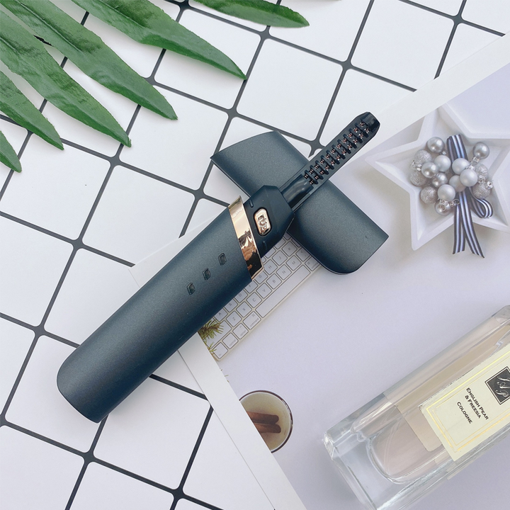 "Elektrisk uppvärmd ögonfransböjare i vit design, snabb uppvärmning för långvarigt böjda och skyddade fransar."