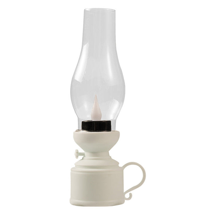 "Elektronisk fotogenlampa med retrodesign i vitt, brons och svart, perfekt för inomhus- och utomhusbruk i hemmet."