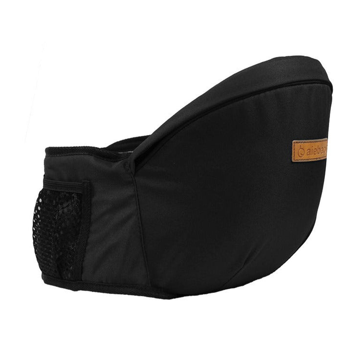 Ergonomisk babyhöftbärare i grått tyg, justerbart bälte, minskar ryggbelastning, flervändbara bärpositioner.