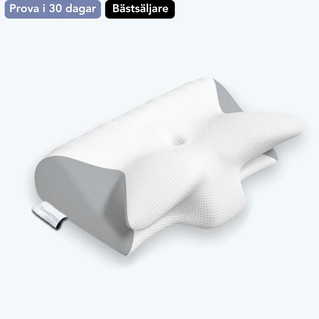 "Ergonomisk nackkudde i minnesskum, vit, med konturer för djupt stöd och komfort, idealisk för alla sovpositioner."