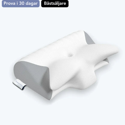 "Ergonomisk nackkudde i minnesskum, vit, med konturer för djupt stöd och komfort, idealisk för alla sovpositioner."