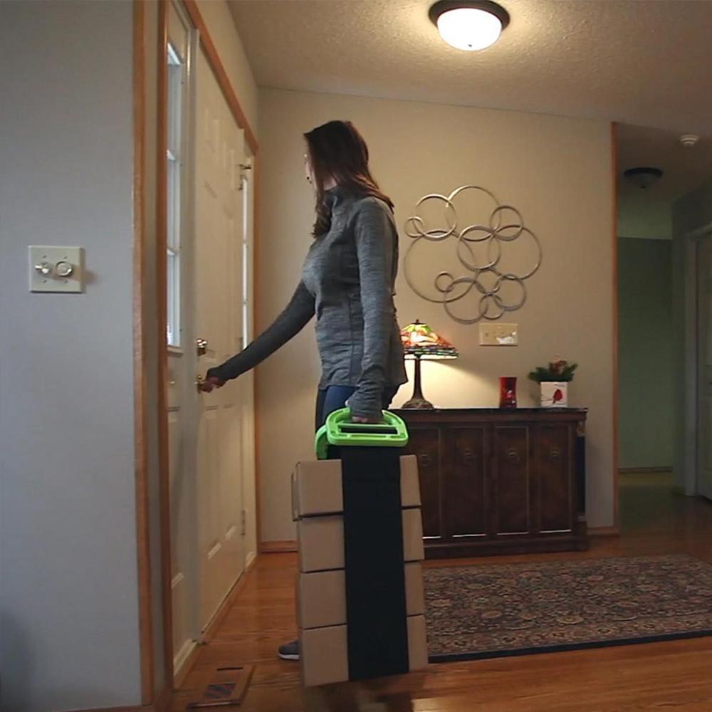 "Ergonomiskt, justerbart lyftbälte för tunga möbler, i slitstark nylon, svart färg, med breda remmar för bekvämt grepp."