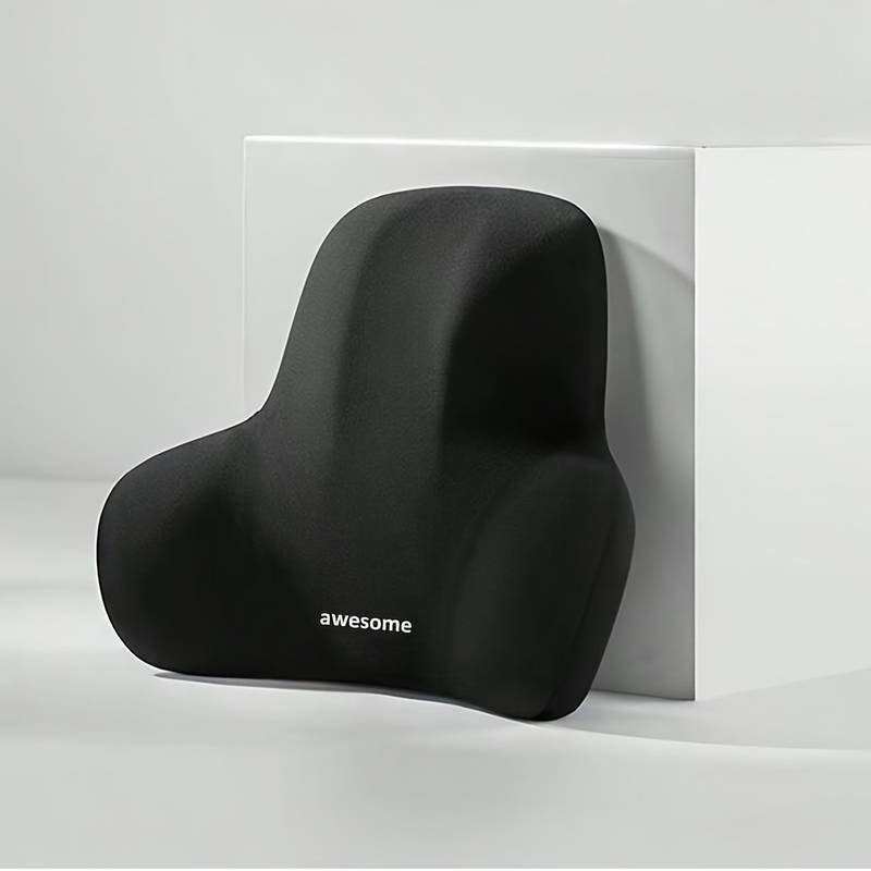 "Ergonomiskt ländryggsstöd med kurvad form, justerbar rem och andningsbart material för förbättrad ryggkomfort."
