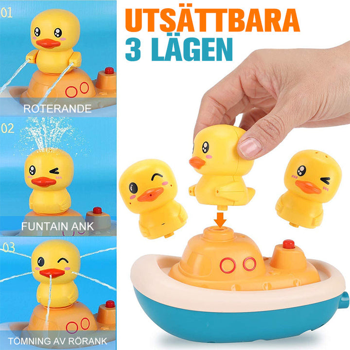 Färgglad bebis anka duschleksak med vattensprutfunktion i form av anka och båt. Idealisk för badlek och motorikträning.