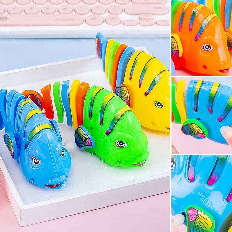 Färgglad fiskleksak för barn med livlig design, 360° rotation och säker plast. Perfekt för kreativ och rolig lek.