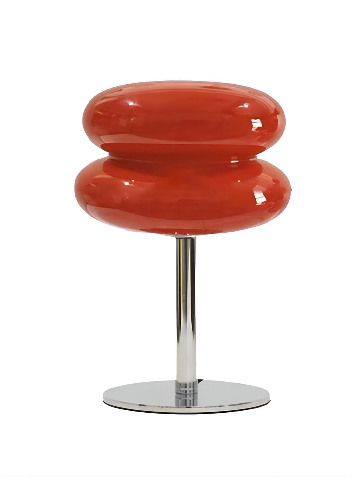 "Färgglad macaroninspirerad bordslampa av glas och järn med trendig design för livlig atmosfär och stilfull dekor."