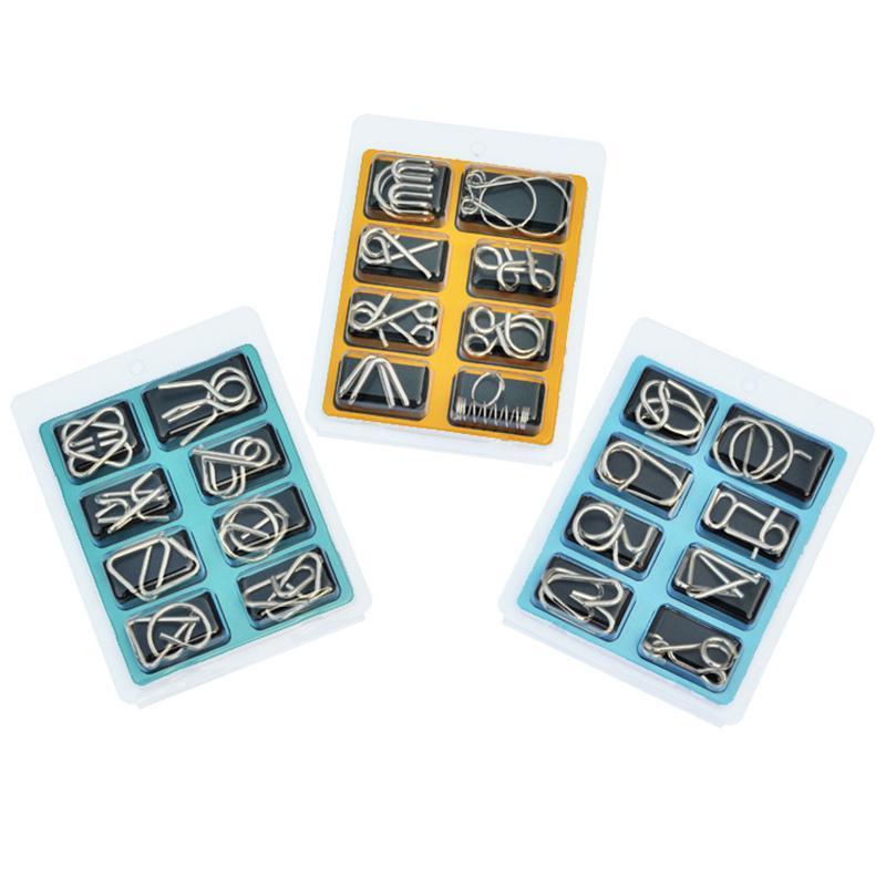 "Färgglad metallpusselring för barn, blå och gul design, utvecklar kreativitet och logiskt tänkande."