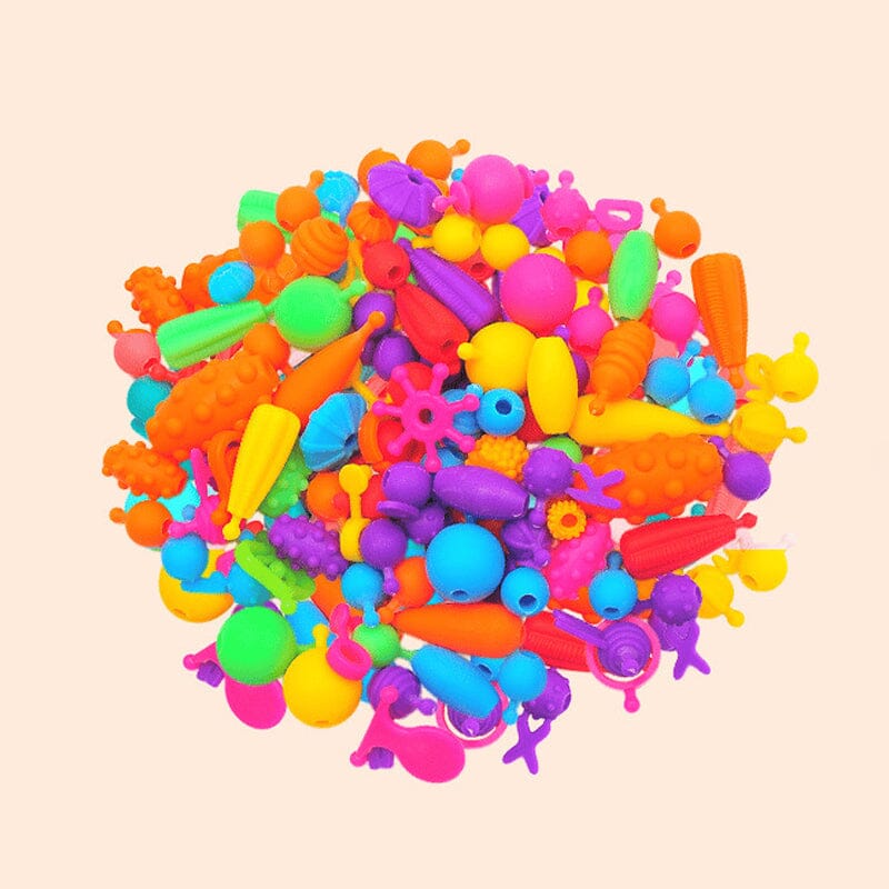 Färgglad pärluppsättning för barn, DIY-smycken skapas lätt med säkra, snäppbara pärlor för halsband och armband.