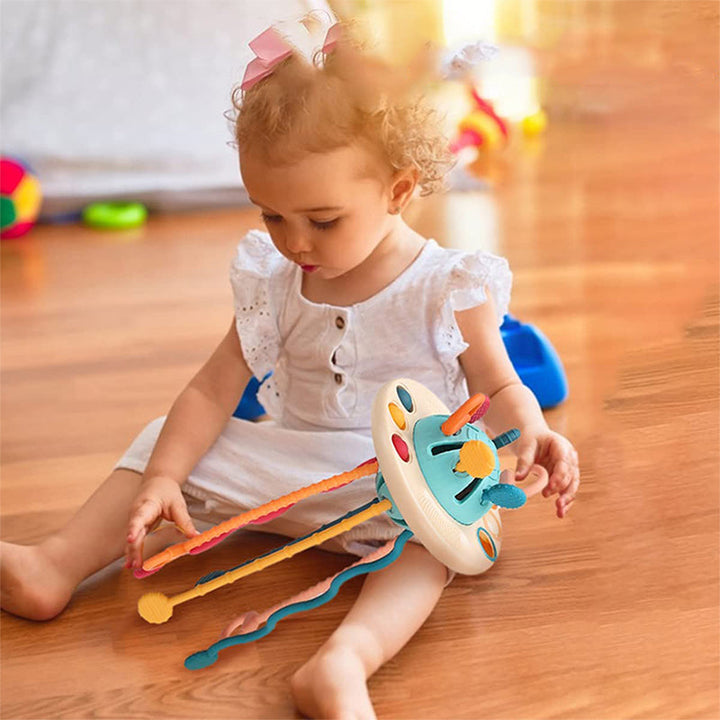 Färgglad silikon UFO-leksak för barn; säker, interaktiv, idealisk för resor och lek, främjar finmotorik och fantasi.