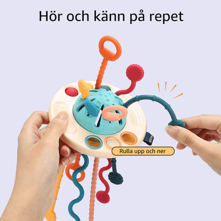 Färgglad silikon UFO-leksak för barn; säker, interaktiv, idealisk för resor och lek, främjar finmotorik och fantasi.