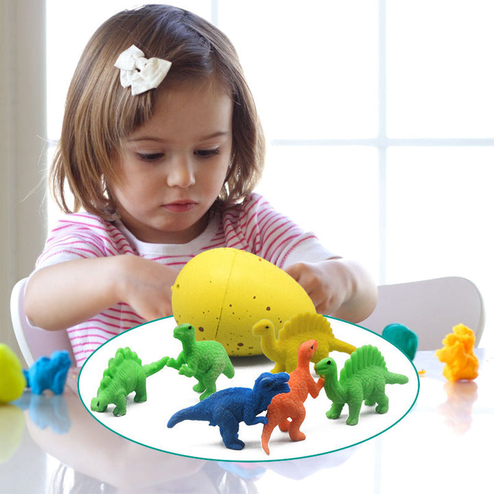 Färgglada dinosaurieägg för barn, spricker i vatten till figurer, pedagogisk leksak inom påsklekar och lärande.