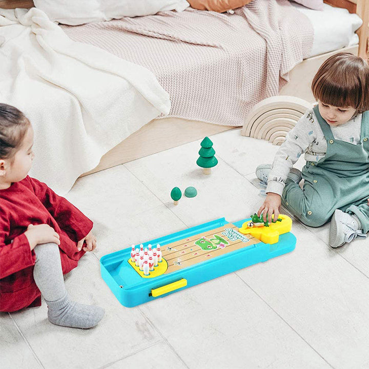 "Färgglatt bowlinggroda leksakspel för barn, med groddesign och ljusa färger, främjar lärande och lekglädje."