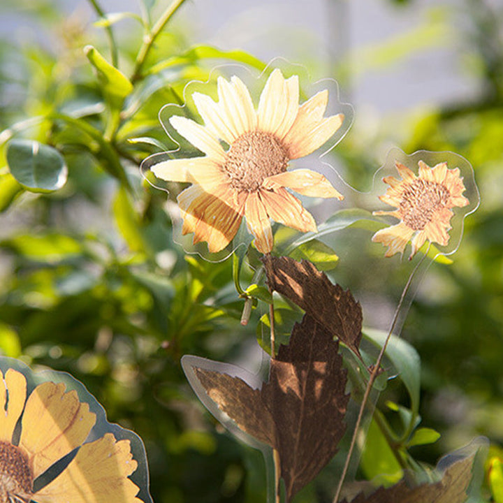 "Färgglatt set av självhäftande blommotiv klistermärken, idealiska för att dekorera släta ytor och DIY-projekt."