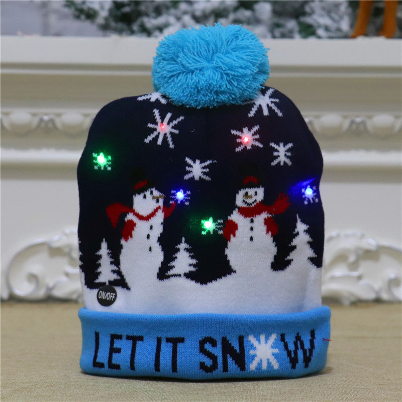 "Färggrann LED-stickad julhatt för dam med lysande LED-lampor och mjukt stickat tyg. Perfekt för vinterfestligheter."
