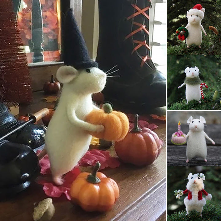"Filtmus med orange pumpa och tematiska accessoarer för Halloween i ullfilt, idealisk som festlig hemdekoration."