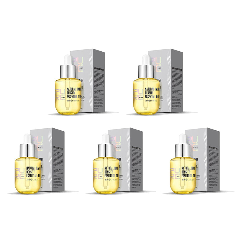 "Flaska med naturlig ingefära- och rosmarinolja för hårväxt, ger näring och främjar fylligare, friskare hår."