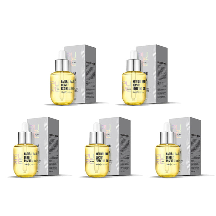 "Flaska med naturlig ingefära- och rosmarinolja för hårväxt, ger näring och främjar fylligare, friskare hår."