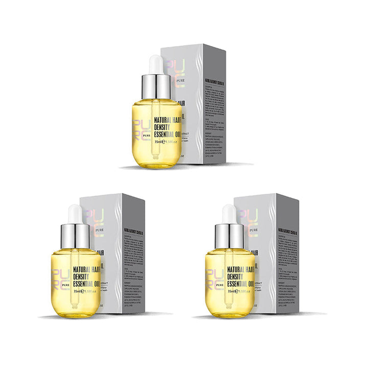 "Flaska med naturlig ingefära- och rosmarinolja för hårväxt, ger näring och främjar fylligare, friskare hår."