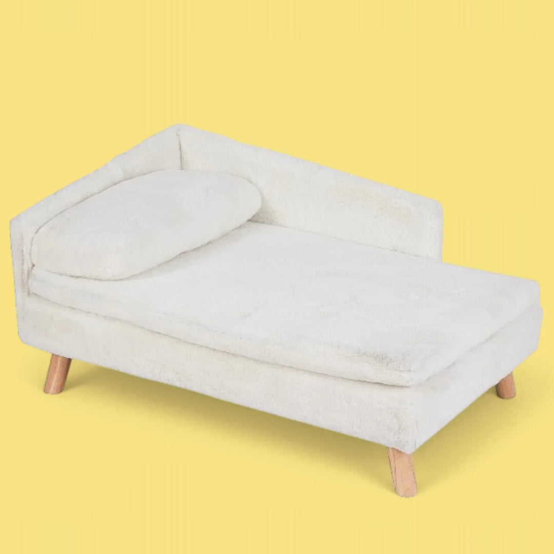"Fluffig beige vårdhundbädd med benstöd, L-formad kudde, skapad för komfort och ångestdämpning, 70x40x39 cm."
