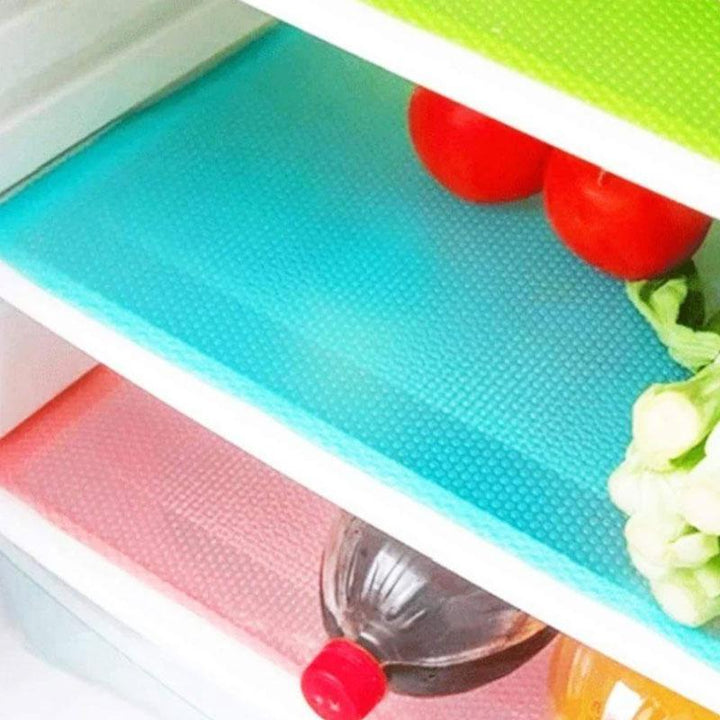 "Fuktsäker kylmatta i blå, grön, rosa och vit för kylskåpsorganisering, fuktabsorbent och antibakteriell design"