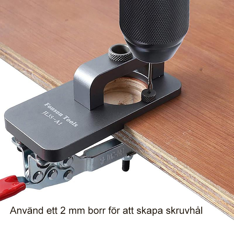 Gångjärnsjigg i grå aluminium för dolda gångjärn, justerbar och hållbar, perfekt för möbelproduktion.