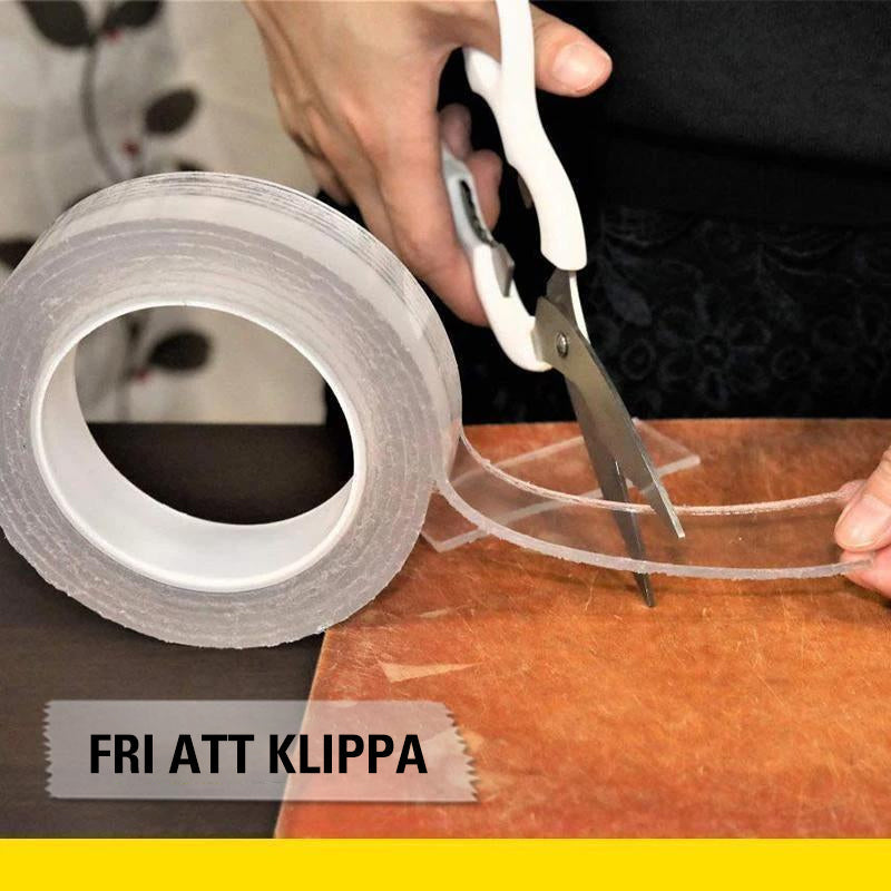 "Genomskinlig, självhäftande nanotejp rullad på spole, stark och återanvändbar, perfekt för hemmet, lätt att fästa"