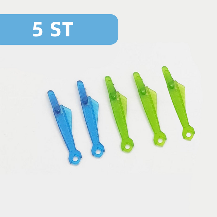 Grön fiskformad nålträdare av plast för symaskiner, enkel trädning, slitstark och kompatibel med äldre och nya maskiner.