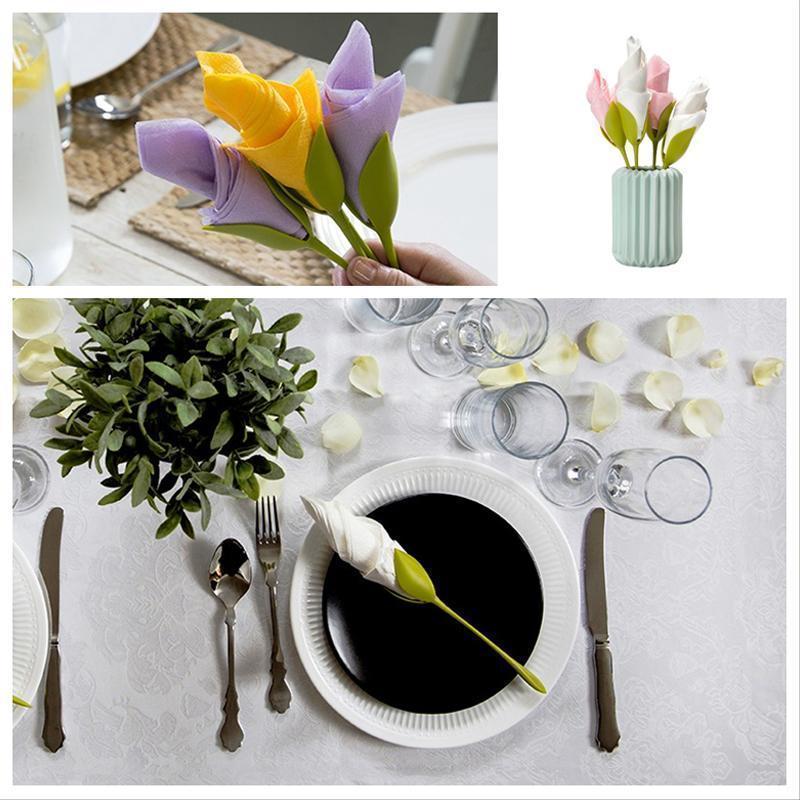 "Grön servetthållare med blomdesign och elegant utseende för borddukning, perfekt för alla tillfällen och dekoration."