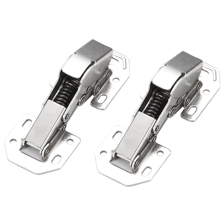 Hålfri och slitsfri gångjärn på en trädörr, robust konstruktion i nickelpläterat stål, enkel och sömlös installation.