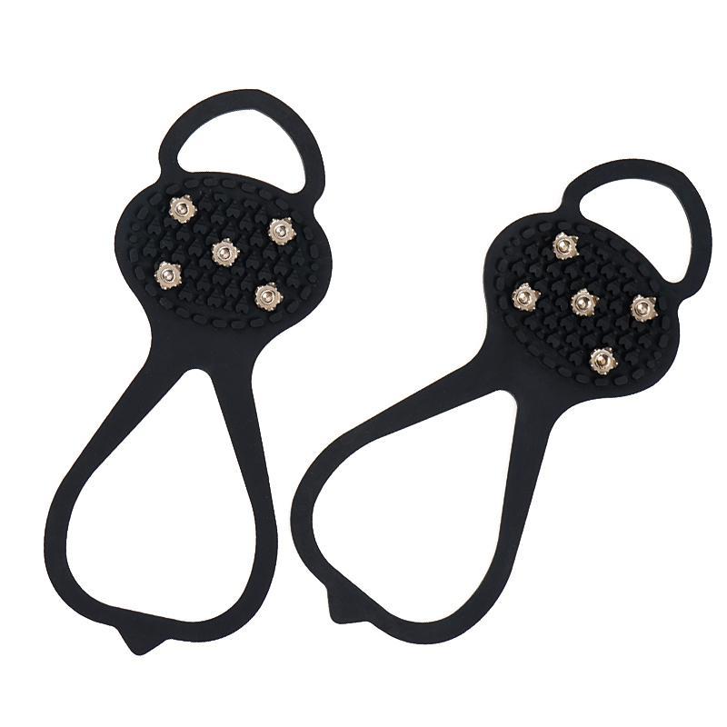 "Halkfria silikon skoskydd, unisex, svart, robusta stålpinnar för isigt underlag, designade för säker vintergång."