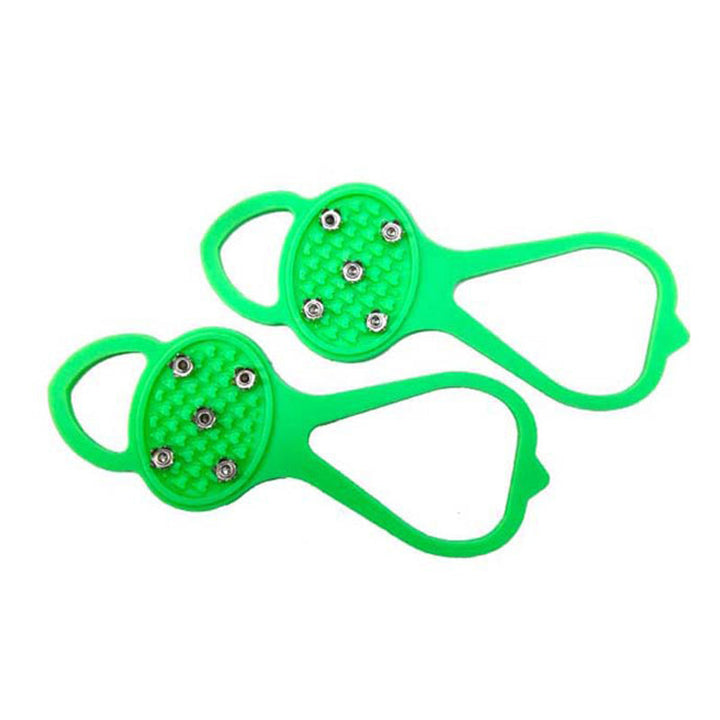 "Halkfria silikon skoskydd, unisex, svart, robusta stålpinnar för isigt underlag, designade för säker vintergång."