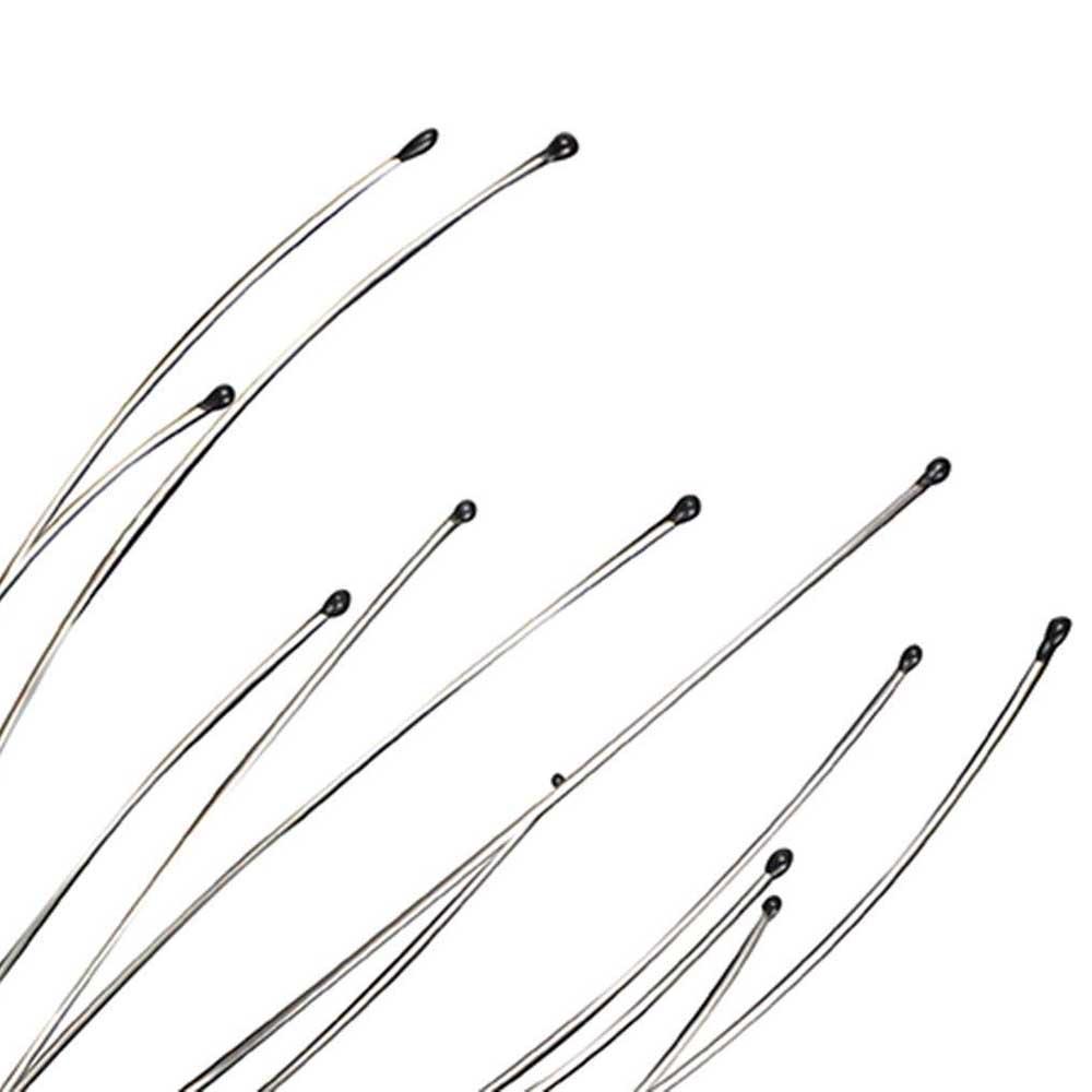 Handhållen huvudmassage, silverfärgad med kloliknande toppar, för hårstimulering och avslappning. Perfekt för välbefinnande.