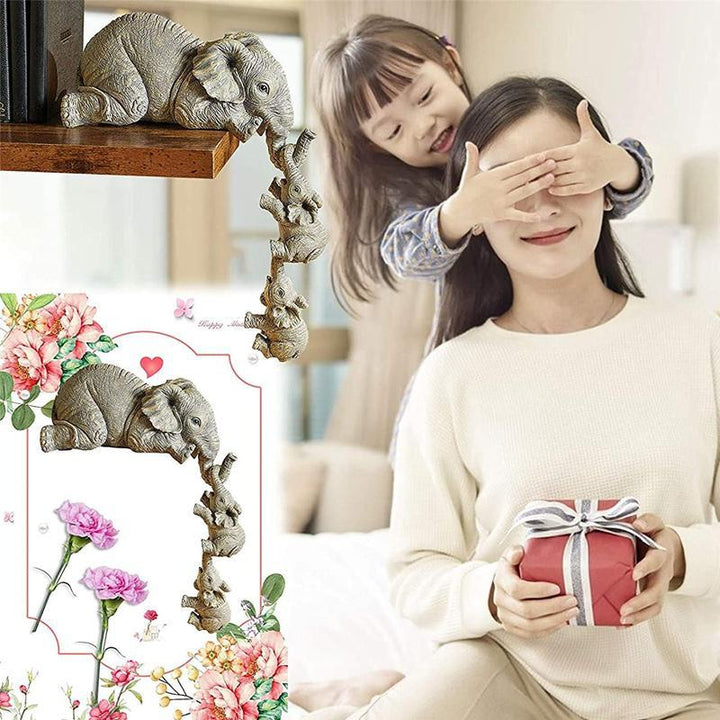 "Handmålad elefantfigur med exotiska detaljer, symboliserar styrka och elegans, perfekt för inredningsdekoration."