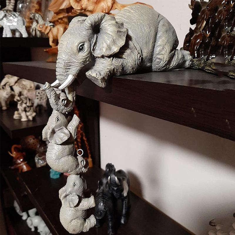 "Handmålad elefantfigur med exotiska detaljer, symboliserar styrka och elegans, perfekt för inredningsdekoration."