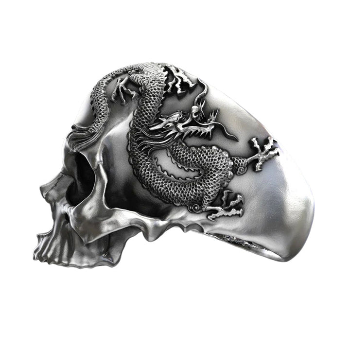 "Herr dödskallering i silver med drakar, gotisk design, detaljer med dödskallar och drakar för kraftfull stil."