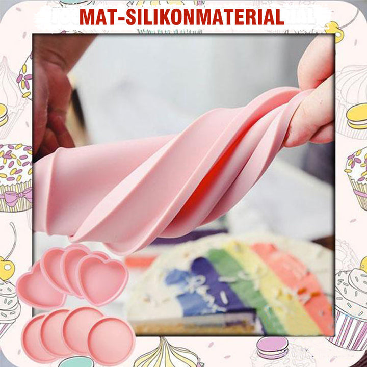 Hjärtformade silikon tårtformar i rosa och blå, perfekt för regnbågstårtor. Flexibla för enkel tårtuttagning.
