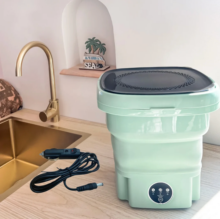 "Hopfällbar portabel tvättmaskin med kompakt design, 6L kapacitet, vit och blå detaljer för effektiv tvätt."