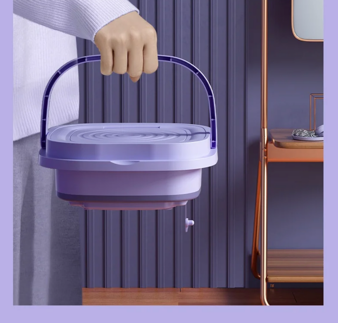 "Hopfällbar portabel tvättmaskin med kompakt design, 6L kapacitet, vit och blå detaljer för effektiv tvätt."