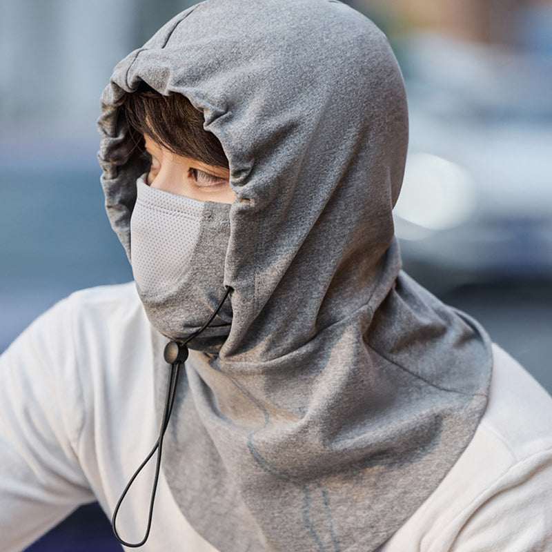 "Huvtröja med ansiktsmask och nackvärmare för vintercykling, i mjukt polyestermaterial, färg svart."