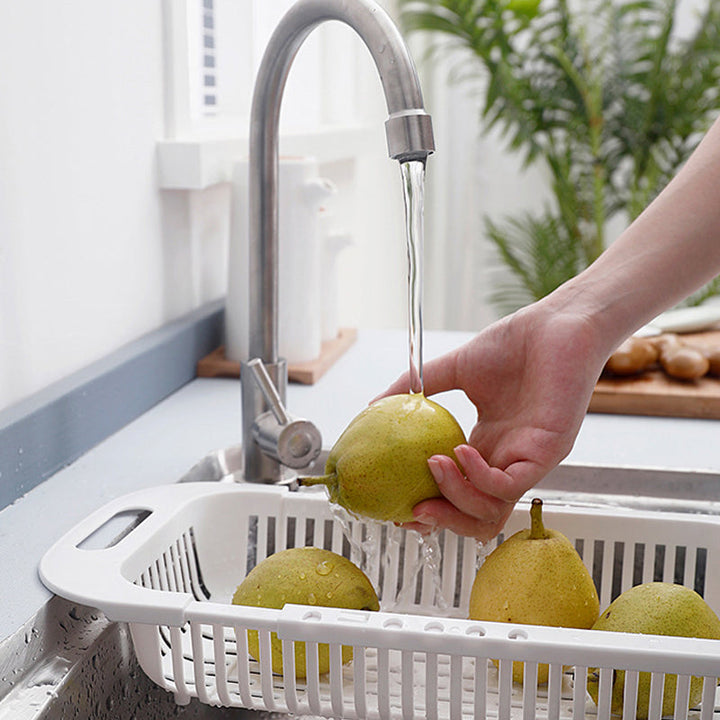 "Ihålig köksavrinningskorg med handtag, blå. Perfekt för frukt, grönsaker; max töjbar längd 45 cm."