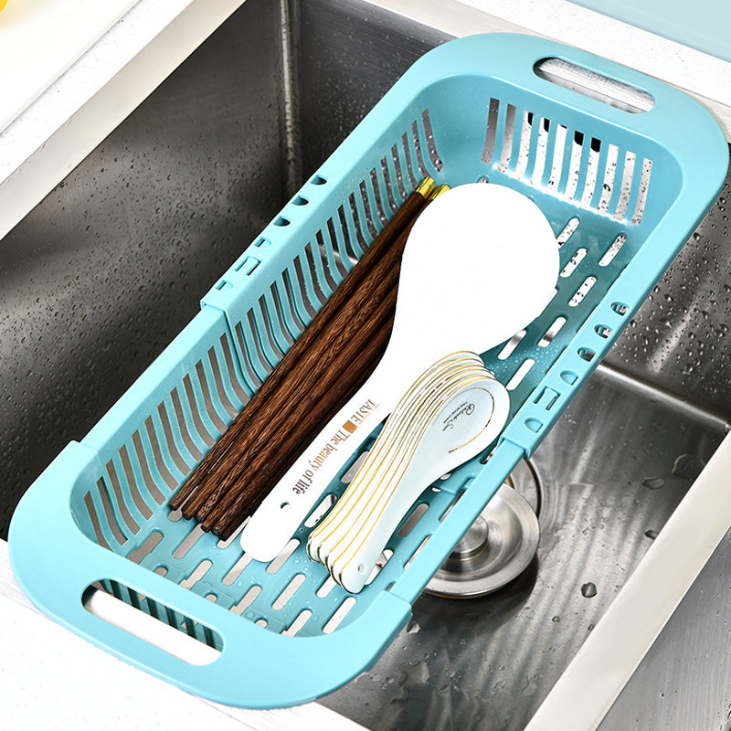"Ihålig köksavrinningskorg med handtag, blå. Perfekt för frukt, grönsaker; max töjbar längd 45 cm."