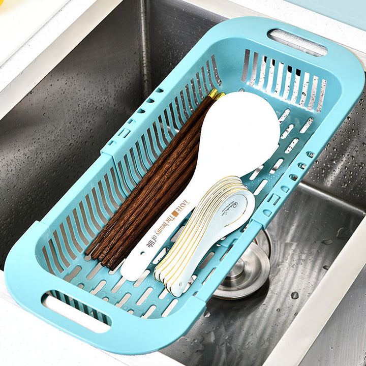 "Ihålig köksavrinningskorg med handtag, blå. Perfekt för frukt, grönsaker; max töjbar längd 45 cm."