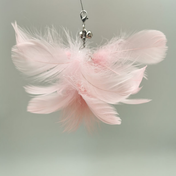 "Interaktiv kattleksak med fjädrar och sugkopp för lekstund. Engagerande färgglad design som stärker kattens instinkter."