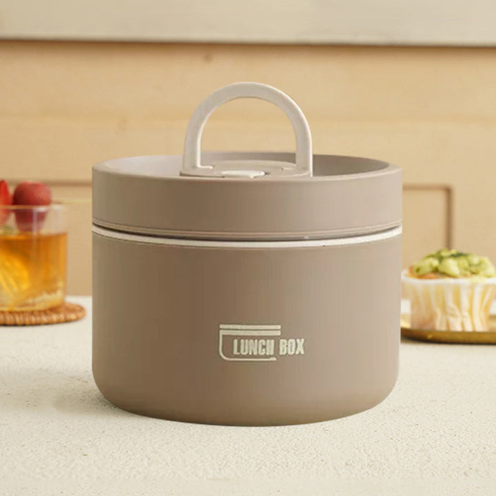 "Isolerad bärbar lunchlåda i blått, brun och beige. Vakuumisolerad för värme och läckagesäker design för mat på språng."
