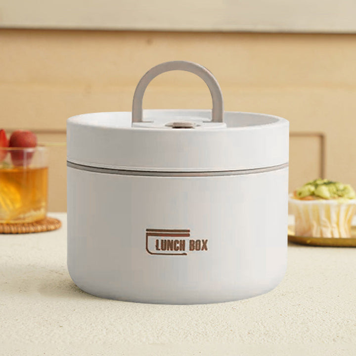 "Isolerad bärbar lunchlåda i blått, brun och beige. Vakuumisolerad för värme och läckagesäker design för mat på språng."