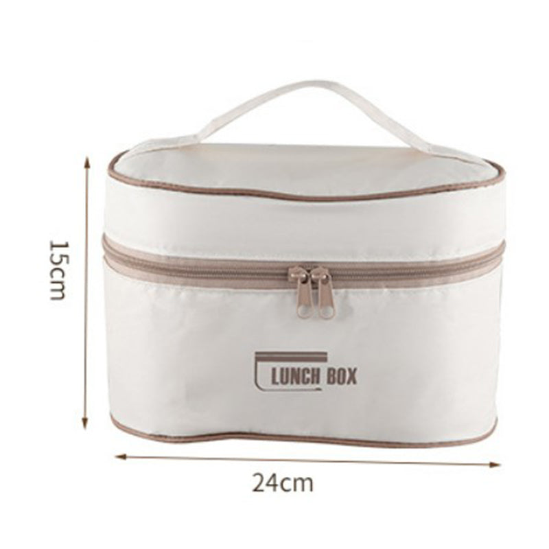 "Isolerad bärbar lunchlåda i blått, brun och beige. Vakuumisolerad för värme och läckagesäker design för mat på språng."